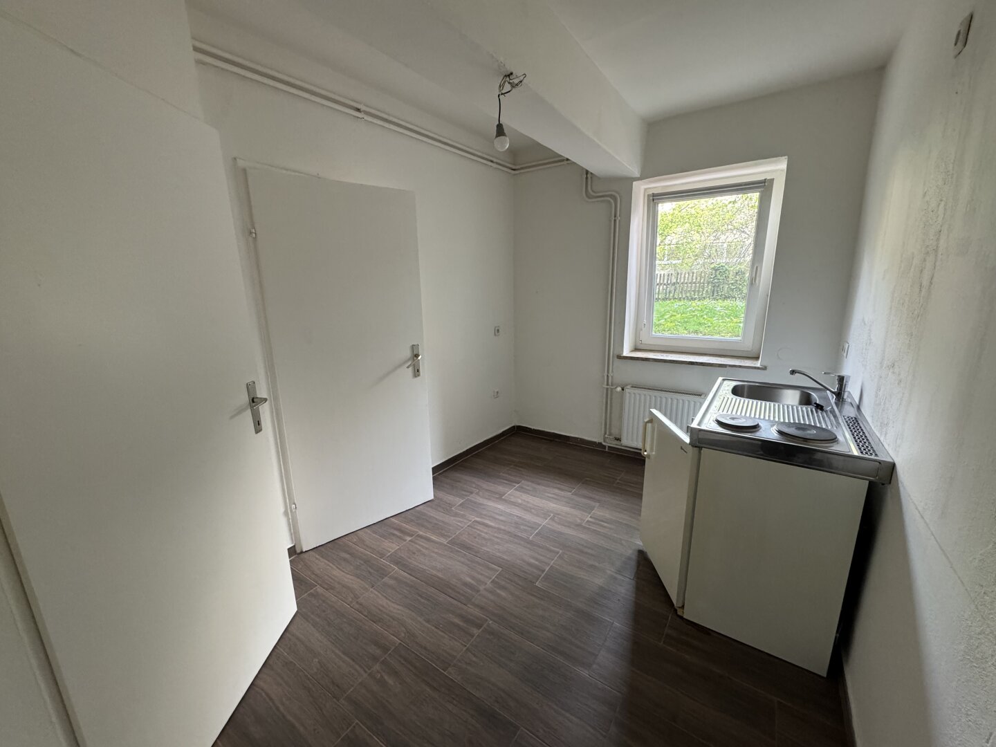 Ruhige 1 Zimmer Wohnung im Erdgeschoss mit Blick in den grünen Innenhof