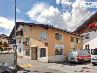 Haus mit Wohnung und Gewerbe