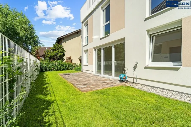 Schlüsselfertige 148m² Traumwohnung mit Eigengarten | Ziegelmassiv-Bauweise | KFZ-Stellplätze + Lademöglichkeit E-Autos | PROVISIONSFREI - Bild