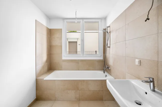 NEUBAU / NÄHE BAHNHOF FLORIDSDORF, U6 - Neue 74 m² EG-Wohnung mit ca. 15 m² Terrasse (Top 01) - Bild