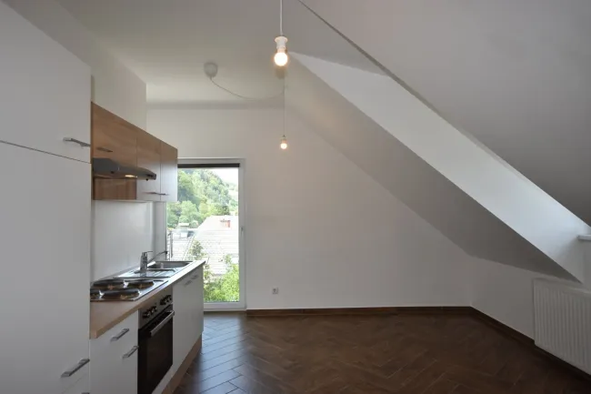 Wohnzimmer - Moderne und gemütliche 2 Zimmer Dachgeschosswohnung Miete Grödig Salzburg