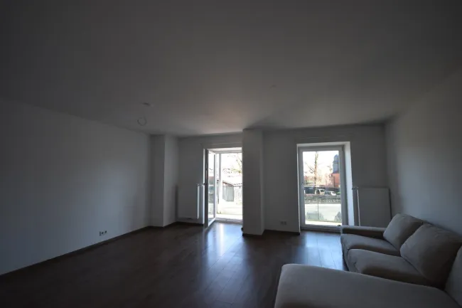 Wohnzimmer - Moderne und geräumige 2 Zimmer Wohnung mit großem Balkon Miete Grödig Salzburg
