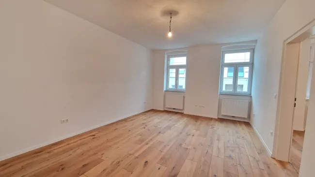 Erstbezug nach Sanierung: Helle Altbauwohnung mit Essküche in Penzing! - Titelbild