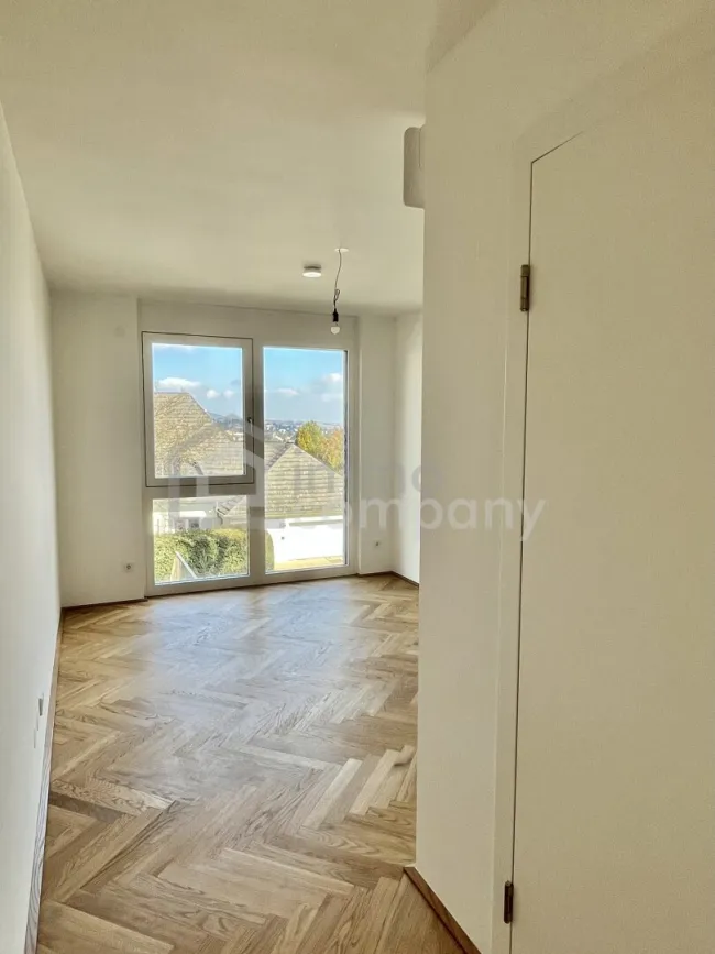 Moderner Luxus in Grünlage mit Fernblick über Wien - Erstbezug - Bild