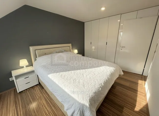 Dachgeschosswohnung in 1040 Wien – modern, geräumig, mit Balkon! - Bild