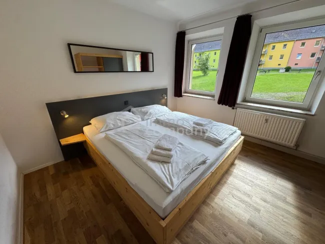 Moderne Anlagewohnung mit Infrarotsauna & Balkon - Bild