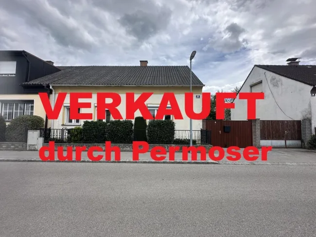 Bungalow mit Garage in zentraler Siedlungslage zu verkaufen - Titelbild