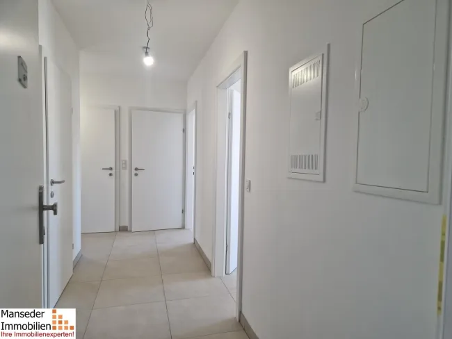 TOLLE NEUBAU-EIGENTUMSWOHNUNG! 76,61 m² + 18,98 m² Balkon! - Titelbild