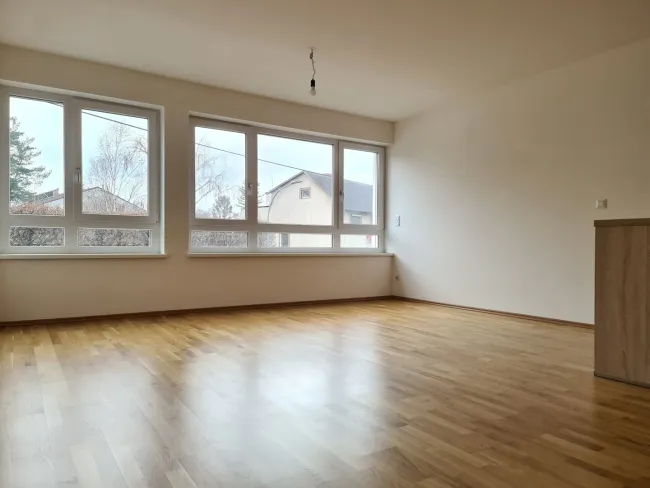 Top-Neubauwohnung mit Garage und Fußbodenheizung - Titelbild