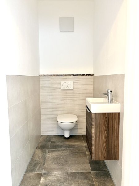 Gemütliche 3-Zimmer-Wohnung mit großer Terrasse, Kamin und zwei Parkplätzen – Ihr neues Zuhause für nur 395.000€!