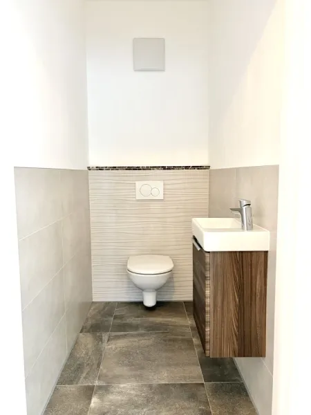 Gemütliche 3-Zimmer-Wohnung mit großer Terrasse, Kamin und zwei Parkplätzen – Ihr neues Zuhause für nur 395.000€!