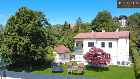 ZWEIFAMILIENHAUS IN GRÜN-RUHELAGE MIT GROSSEM GARTEN UND WEITBLICK