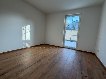 Moderne Erdgeschosswohnung mit Terrasse und Tiefgarage