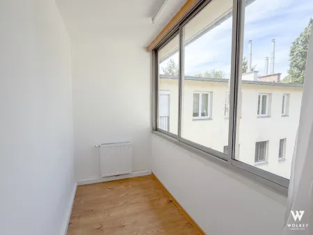 Lichtdurchflutete 2-Zimmer-Wohnung mit verglaster Loggia – ruhiges Wohnen in Döblinger Toplage!