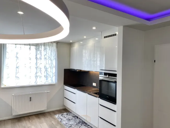 GARTENGLÜCK IN MODERNEM AMBIENTE: 2-Zimmer-Wohnung mit Tiefgarage - Bild