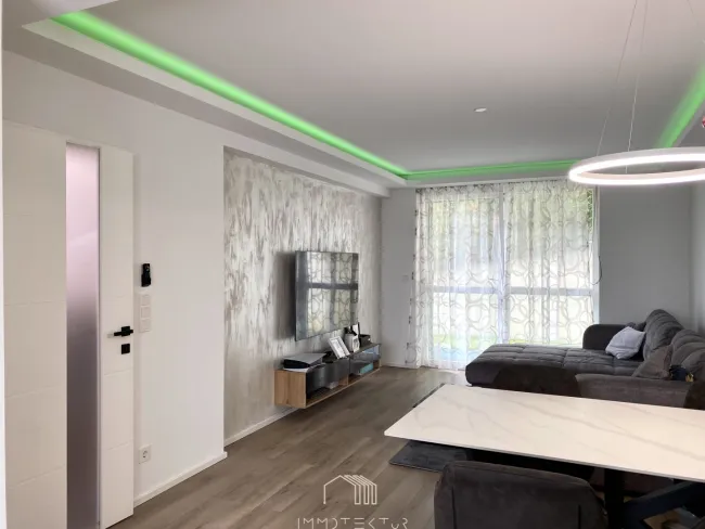 GARTENGLÜCK IN MODERNEM AMBIENTE: 2-Zimmer-Wohnung mit Tiefgarage - Bild