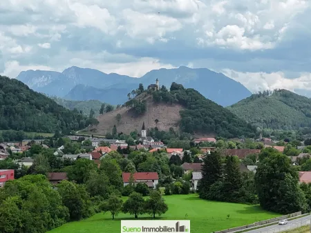 Modernes Zwei-Familienhaus: Naturnah wohnen mit Bachnähe und traumhaftem Bergblick
