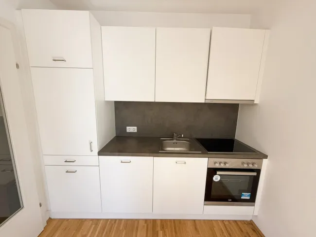 Stadtnah, charmant & clever geschnitten – 2-Zimmer-Wohntraum mit Südbalkon! - Bild