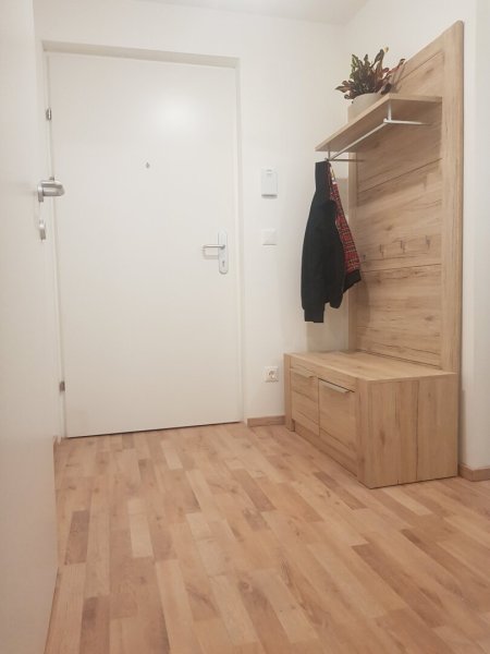 Moderne Gartenwohnung mit Terrasse in neuwertigem Wohnkomplex
