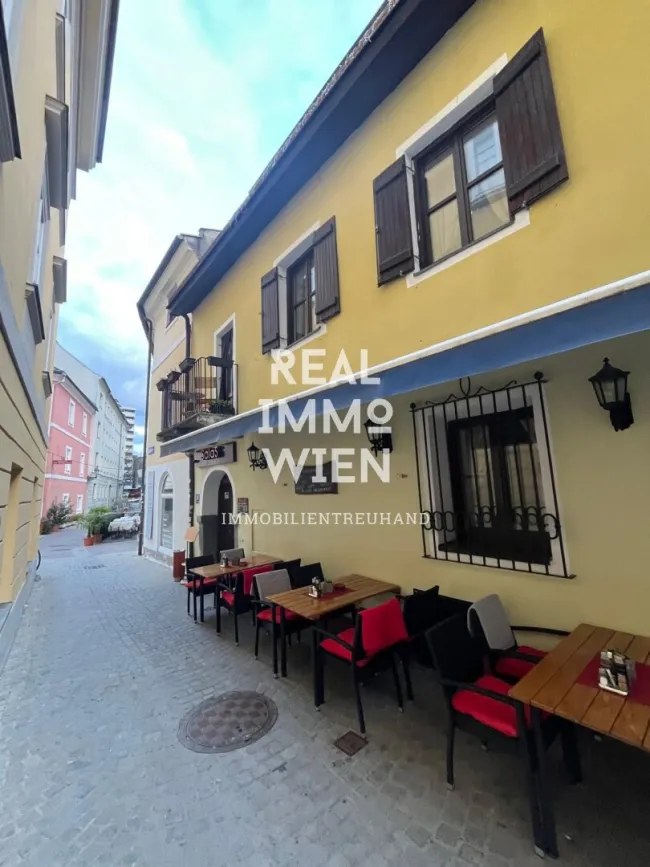 Top Gastgewerbe mit Wohnung, Terrasse & Bar in Klagenfurt - Titelbild