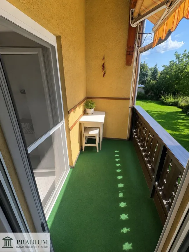 Stilvolle Anlegerwohnung mit Balkon und Grünblick - Titelbild