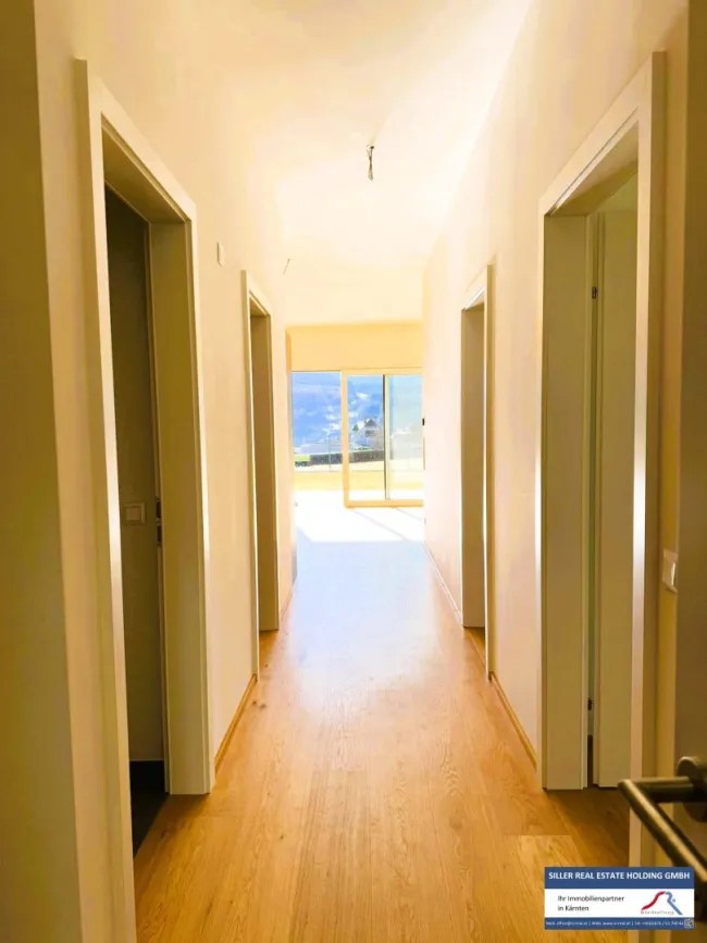 SEEBODEN - Gartenwohnung mit Stil & Aussicht (Top C3) - Bild