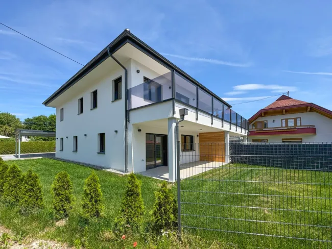 LIVIN Deluxe - Klopeiner See I schlüsselfertige Wohnung mit großem Privatgarten - Titelbild