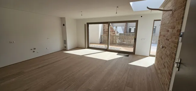 Moderne Neubauwohnung mit großer Terrasse in Baden - Bild
