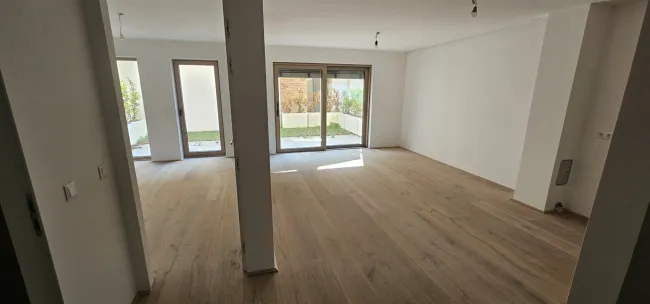 Sonnige Gartenwohnung in Baden – Neubau-Erstbezug - Titelbild