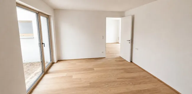 Erstbezug in Baden: Helle Gartenwohnung in attraktiver Lage - Bild