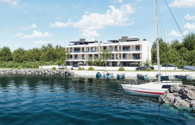 Exklusive Gartenwohnung in erster Meeresreihe mit Swimmingpool – Luxus trifft Lage - Bild