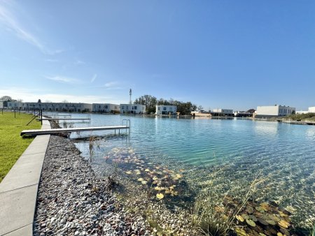 SONNENWEIHER - HOCHWERTIGES DOPPELHAUS AM SEE + GARTEN