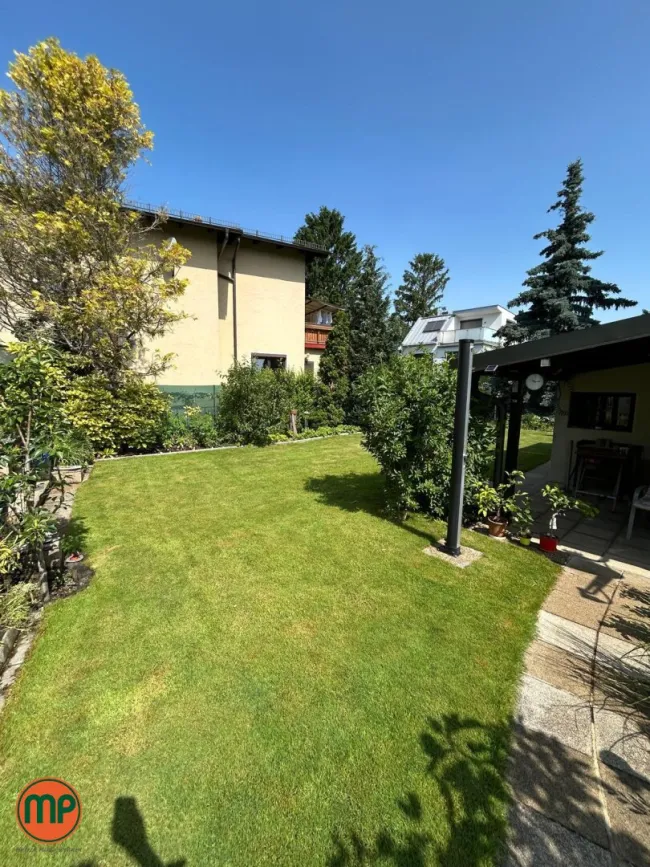 Ein Zuhause am Wasser: Haus mit Garten und bestehendem Wohnrecht an der Neuen Donau - Bild