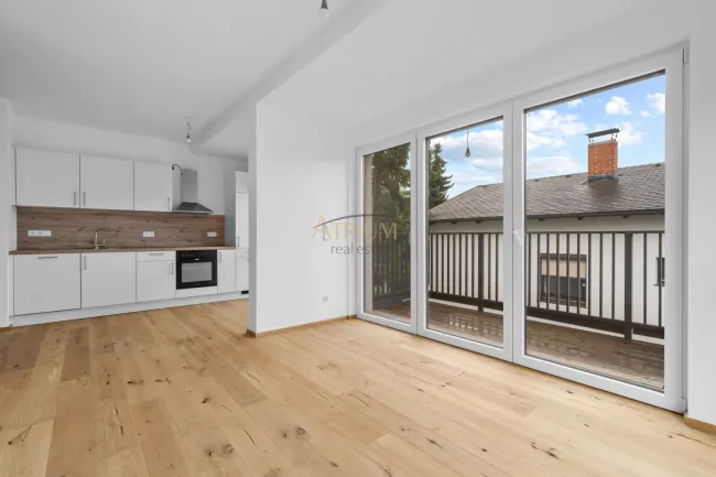 Ruhige Grünlage eine echte Wohlfühloase.🌳 Angenehme Atmosphäre machen diese Lage zu einem kleinen Paradies🌅.Erstbezug – moderne 2-Zimmer-Wohnung mit Balkon & Fernblick - Auf Baurechtsgrund errichtet! - Titelbild