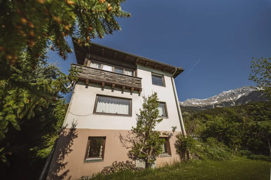Innsbruck-Hötting, Traumgrundstück in Hanglage mit 360° Blick - Titelbild