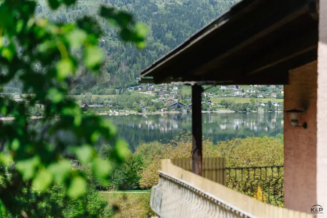 Einmaliges Baugrundstück mit Altbestand und seltener Freizeitwohnsitzwidmung – mit Seeblick am Ossiacher See - Titelbild