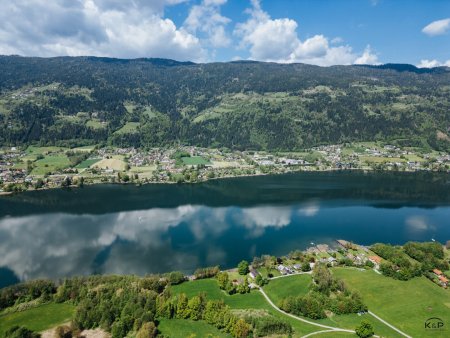 Exklusives Baugrundstück mit Seeblick und Freizeitwohnsitzwidmung – Rarität am Ossiacher See