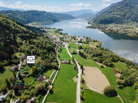 Exklusives Baugrundstück mit Seeblick und Freizeitwohnsitzwidmung – Rarität am Ossiacher See
