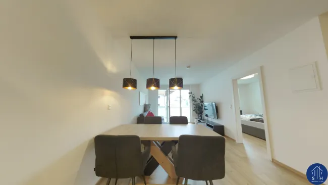 Modernes Wohnglück - Stilvolle 2-Zimmer-Wohnung mit Carport & Balkon in Radfeld zu verkaufen - Titelbild