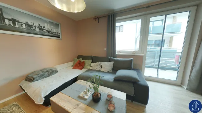 Charmante 2-Zimmer-Wohnung mit großzügigem Sonnenbalkon in Radfeld zu verkaufen - Titelbild
