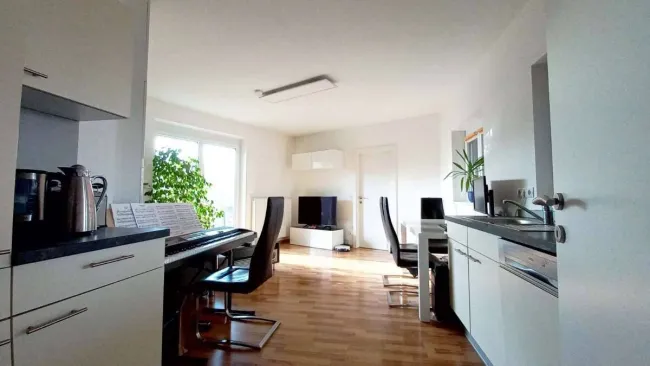 Attraktive Anlegerwohnung mit großem Garten und Carport! - Titelbild