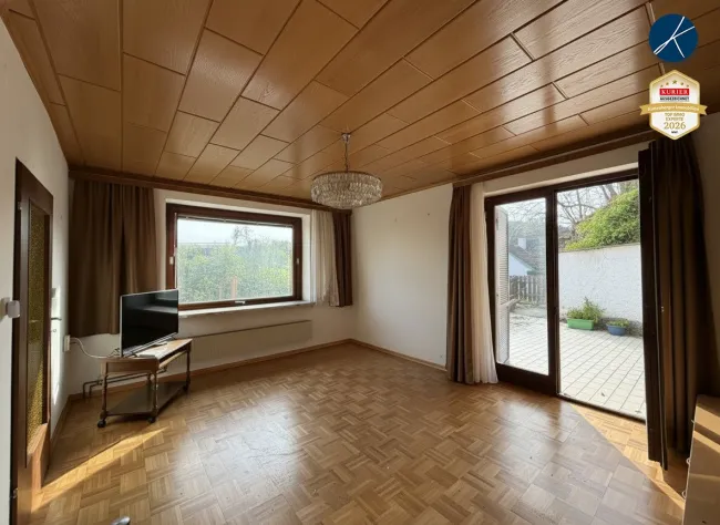 Wohnzimmer mit Ausgang zur Terrasse