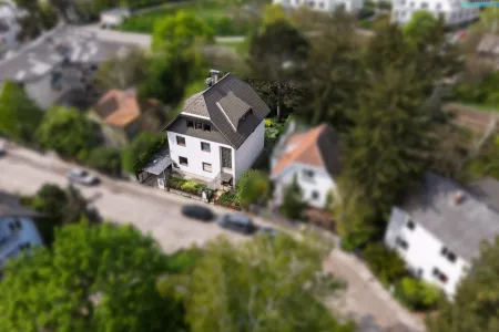 Charakterhaus mit großem Entwicklungspotenzial in begehrter Grünlage im Süden Wiens