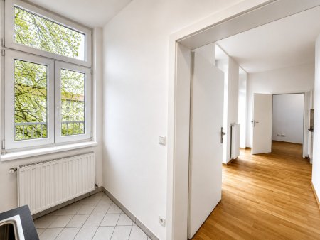 Großzügige City Residence mit zentrumsnahem Altbaucharme, Freifläche & Grünblick