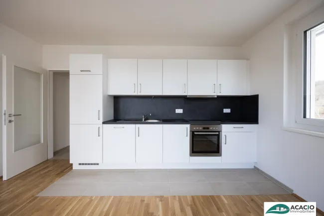 3-Zimmer Wohnung mit Tageslicht-Bad und Eck-Balkon zum Wohlfühlen! Leben im Grünen, aber nahe der Stadt! Tiefgaragenplatz optional verfügbar! - Bild