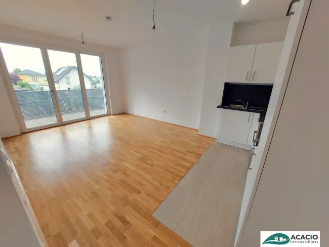 Abendsonne genießen: 2-Zimmerwohnung mit westseitigem überdachtem Balkon mit optimalem Grundriss im Wohnpark Tullnerfeld - im Grünen wohnen, aber in der Stadt arbeiten - Tiefgaragenplatz optional möglich! - Titelbild