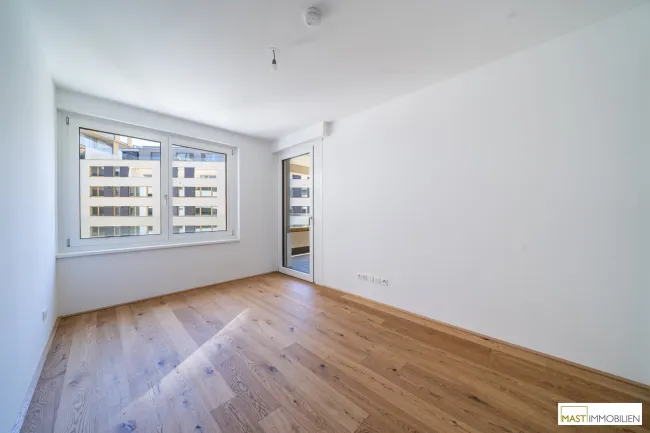 *Erstbezug* Helle 2-Zimmer Wohnung mit großzügiger Freifläche! - Bild