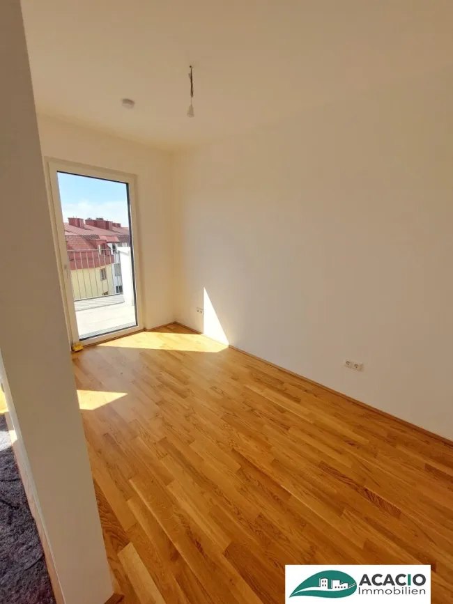 Ideal für Singles: westseitige Dachgeschoßwohnung mit großer Terrasse inkl. Küche - inkl. PKW-Stellplatz – Neubau! Erstbezug! - Nähe St. Pölten - Bild