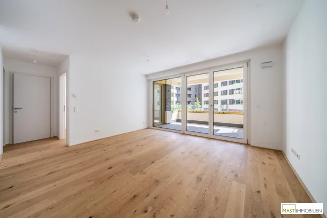 *Erstbezug* 2-Zimmer Wohnung mit rund 9,5 qm Freifläche - Titelbild