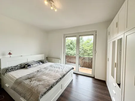 Schlafzimmer mit Balkon